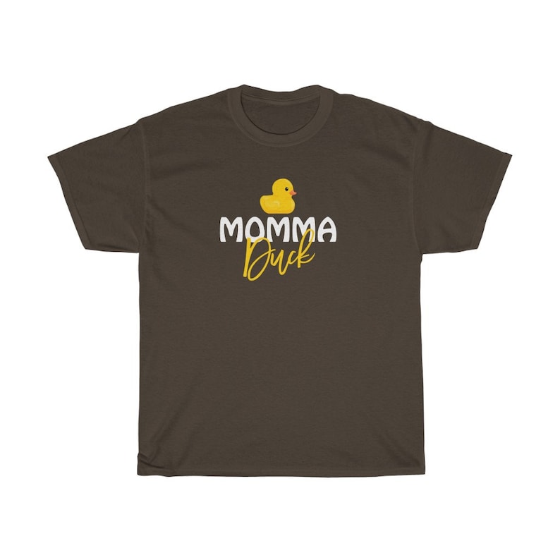 May include: A brown t-shirt featuring a yellow rubber duck and the text "MOMMA Duck" in white.