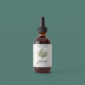 May include: A brown glass bottle with a black dropper and a white label. The label features the text "ARTEMISIA FARM & VINEYARD" and "junio ELDER BITTERS". The bottle contains 4 fl oz (120 ml) of liquid, with 40% ABV.