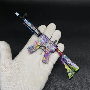 Miniaturas de pistolas para juegos CSGO, paquete 4 en 1: AWP Dragon Lore, M4A1-S Printstream, M4A4 In Living Color, AK-47 Wild Lotus IRL Tiny Gun M4A4 In Living