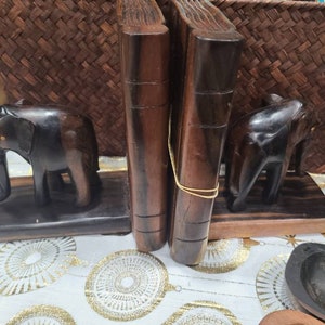 Hand carved ebony wood African book ends