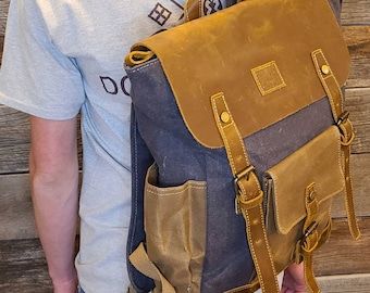 Genuine leather and waxed canvas backpacks