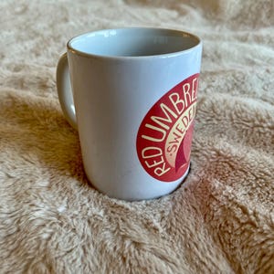 Mug with Red Umbrella Sweden logo