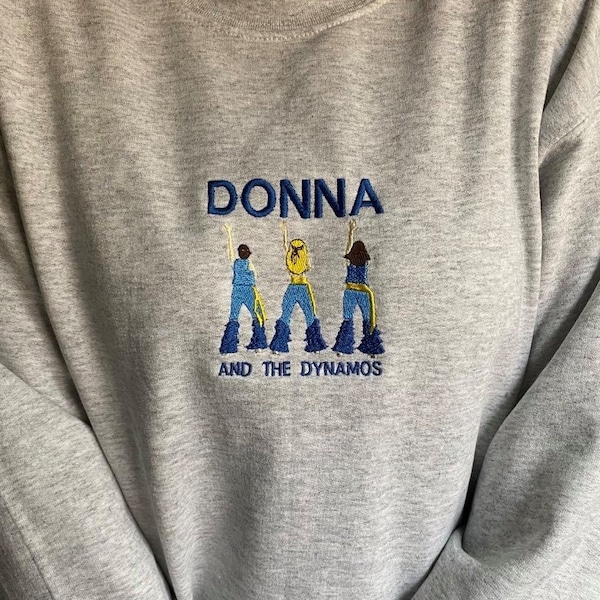 Donna y la sudadera bordada Dynamos