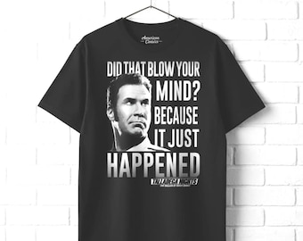 May include: A black short-sleeve t-shirt featuring a black and white portrait of Will Ferrell. The text reads: DID THAT BLOW YOUR MIND? BECAUSE IT JUST HAPPENED. Below the text is the Talladega Nights: The Ballad of Ricky Bobby logo.