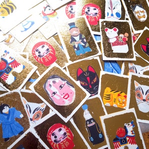 Cartes masques et jouets japonais dorées à la main à offrir