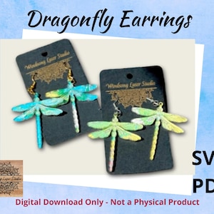 May include: Two pairs of dragonfly earrings are displayed on black cards. The earrings have colorful wings and long, slender bodies. The text "Dragonfly Earrings" is at the top, with "SVG" and "PDF" on the right. The bottom text reads "Digital Download Only - Not a Physical Product."
