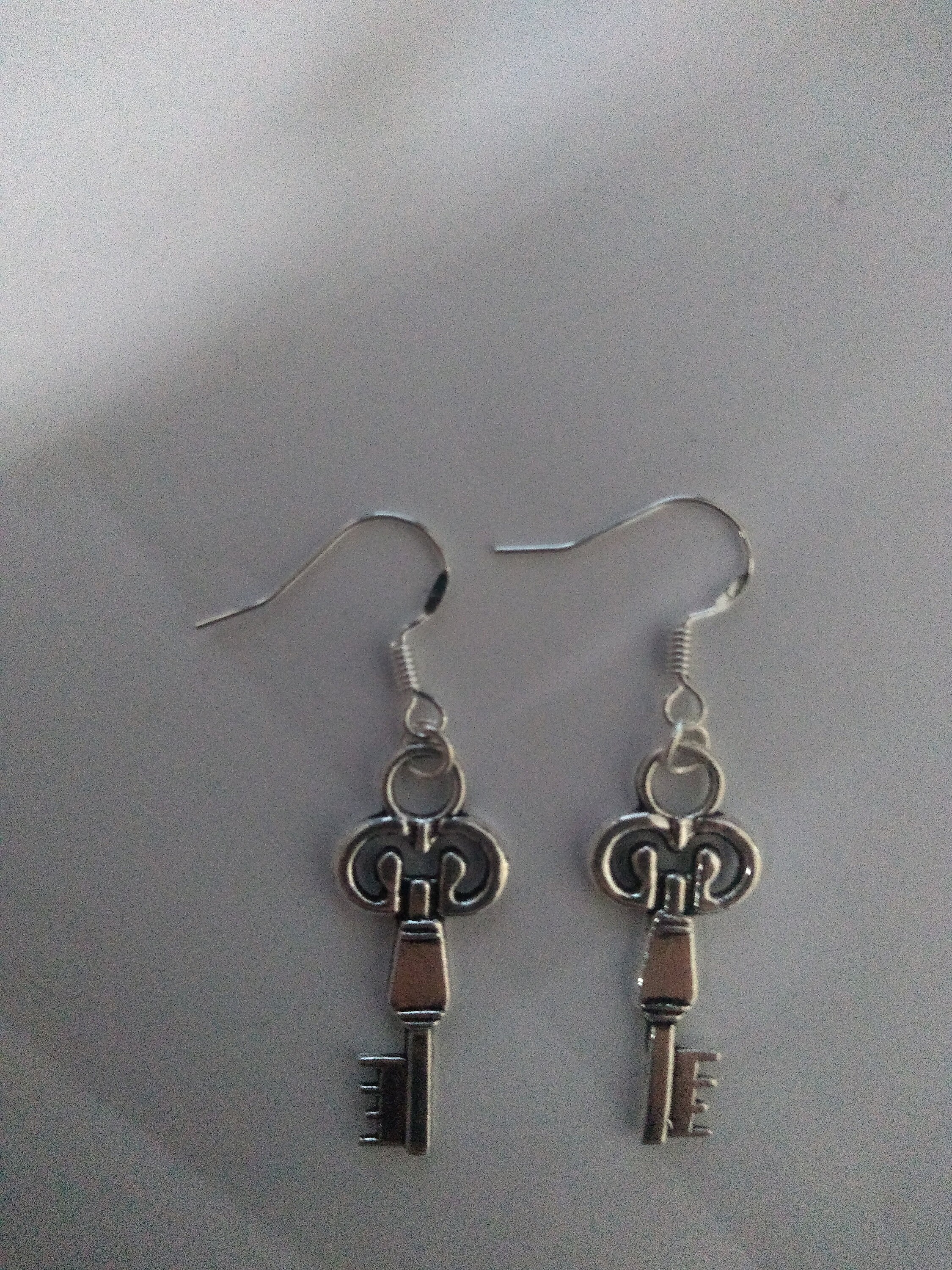 Sterling silver on sale key earrings