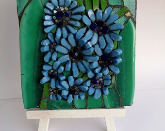 Mosaic painting with blue flowers