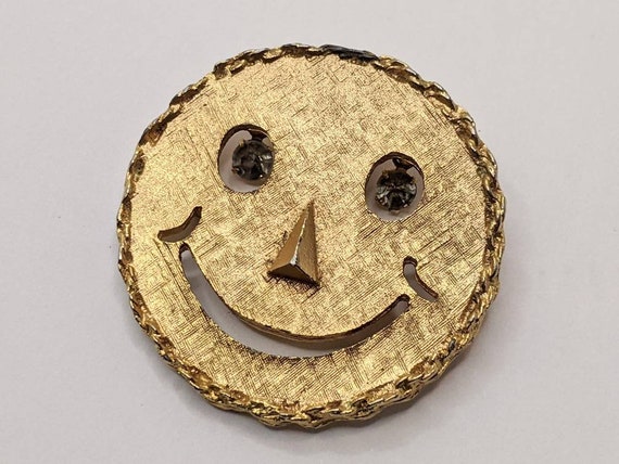 smiley brooch