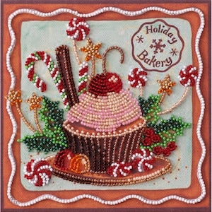 May include: A beaded holiday cupcake with a red cherry on top, surrounded by candy canes, holly, and stars. The cupcake is on a brown plate with a white rim. The background is a light green with a brown border. The text "Holiday Bakery" is in a brown circle with a snowflake in the center.