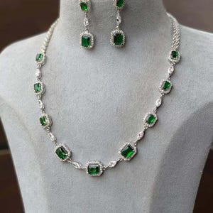 Emerald Green Necklace Set: American Diamond Silver Finish Cocktail Jewelry