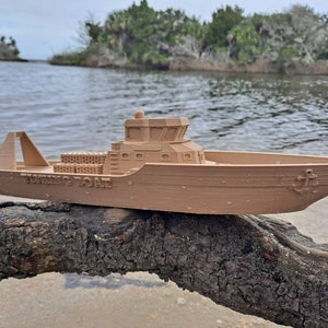 Toy fishing boat. Customizable. 15 inches long. Floats very well 3d printed from Biodegradable PLA plastic.