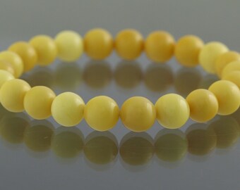 White butter olive beads genuine baltic amber stretch bracelet 5.6g b150709-12 White butter olive beads genuine baltic amber stretch bracelet 5.6g b150709-12
