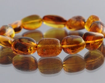 White butter olive beads genuine baltic amber stretch bracelet 5.6g b150709-12 White butter olive beads genuine baltic amber stretch bracelet 5.6g b150709-12