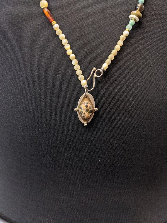 multi carved stone or gem necklace preowned