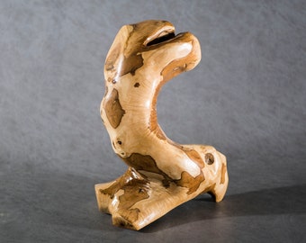 Handmade abstract sculpture from olive wood