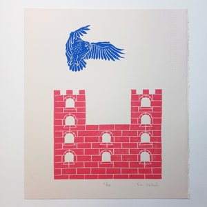 May include: A blue bird flies over a red brick castle with arched windows. The print is signed "Sue  McLeod" and numbered "1/50".