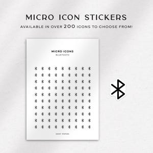May include: A sheet of micro icon stickers with the text "MICRO ICON STICKERS" and "AVAILABLE IN OVER 200 ICONS TO CHOOSE FROM!". The sheet features a Bluetooth icon and the word "BLUETOOTH". A single Bluetooth sticker is also shown.