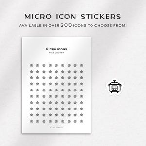 May include: A sheet of 100 small black and white rice cooker icons on a white background. The icons are arranged in a grid pattern. The text "MICRO ICONS" and "RICE COOKER" is printed at the top of the sheet. The text "DAISY DADES" is printed at the bottom of the sheet.