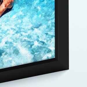 May include: A framed painting of a person swimming in a turquoise blue ocean with white foamy waves. The painting has a textured, brushstroke effect.