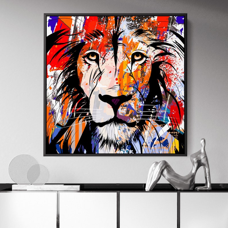 May include: Abstract painting of a lion's face with a colourful, splatter paint background. The lion's face is in focus, with the background blurred. The colours are bright and vibrant, including red, orange, yellow, blue, green, and purple.