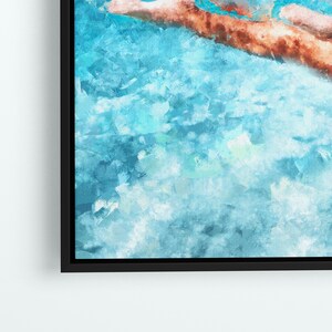 May include: A framed abstract painting with a blue and white color scheme. The painting has a textured, brushstroke effect.