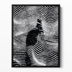 May include: Black and white abstract art print featuring a silhouette of a person's body with wavy lines.