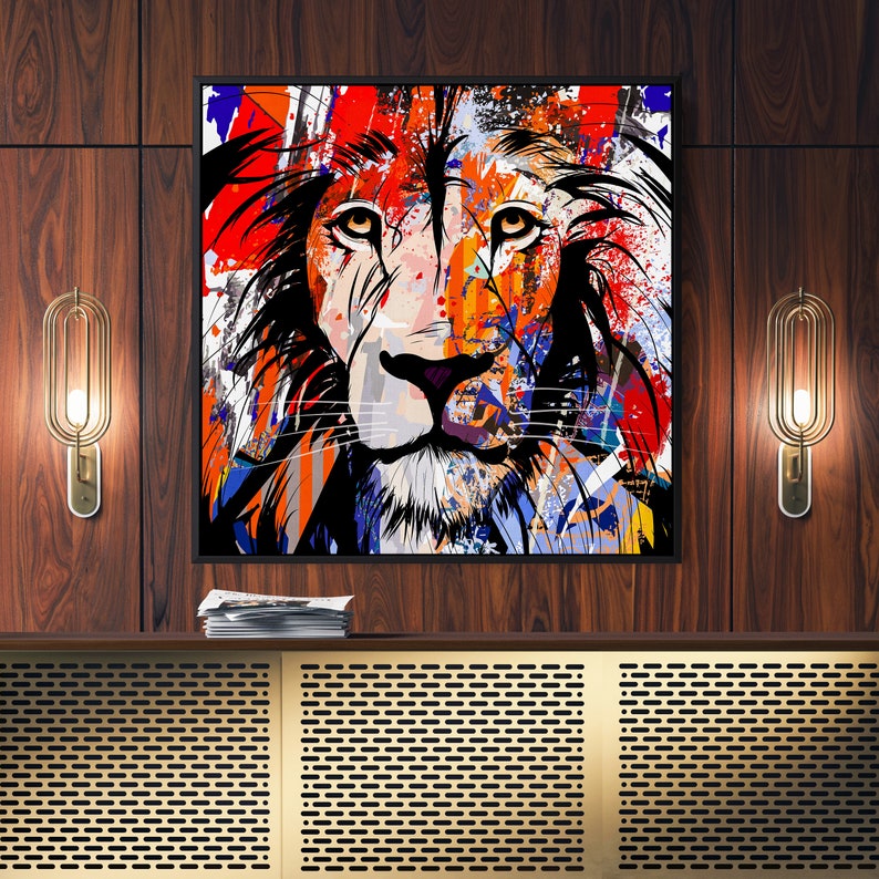 May include: Abstract painting of a lion's face in a colourful, splatter-paint style. The lion's face is in the centre of the painting, with a black background and splashes of red, orange, yellow, blue, and green paint.