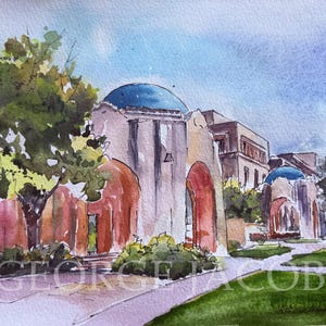 May include: Watercolour painting of a building with a blue dome and arched doorways. The artwork features a palette of muted pinks, oranges, and blues, with green foliage and a paved walkway in the foreground. The artist's signature is visible.