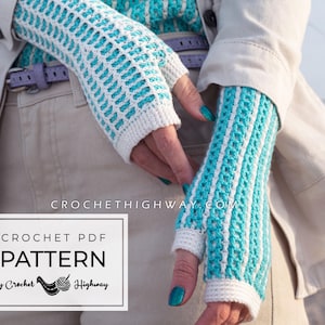 May include: A pair of turquoise and white crocheted fingerless gloves. The gloves have an open weave pattern with white cuffs and turquoise detailing. The image includes the text "CROCHET PDF PATTERN by Crochet Highway".