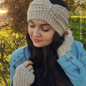 May include: A woman wearing a beige crocheted headband and matching fingerless gloves. The headband has a knotted design and the gloves are textured.