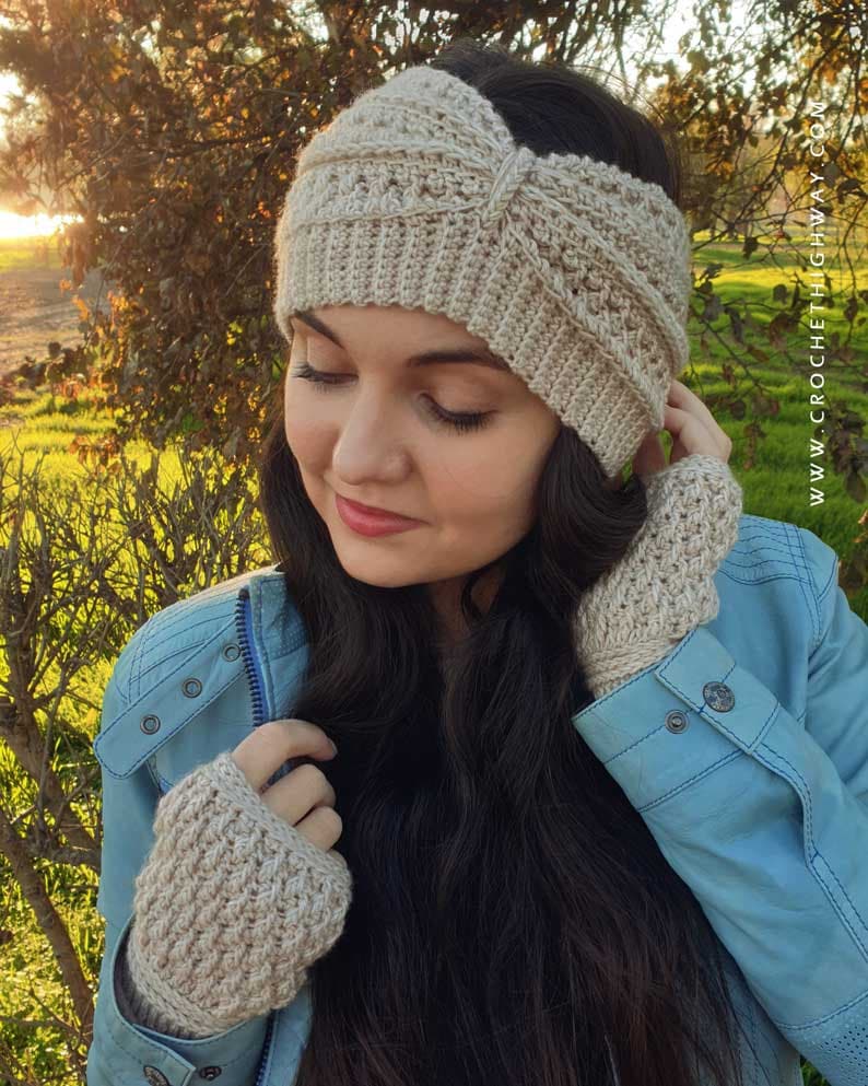 May include: A woman wearing a beige crocheted headband and matching fingerless gloves. The headband has a knotted design and the gloves are textured.