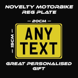 May include: Yellow novelty motorbike registration plate with black text that reads "ANY TEXT". The plate is 20 cm wide and 15 cm high. Great personalised gift.