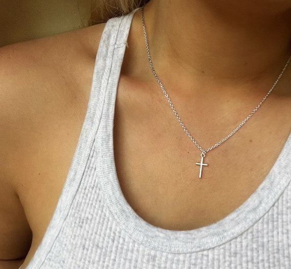 Dainty crucifix best sale necklace