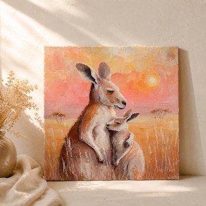 May include: Square canvas art featuring a mother kangaroo and joey embracing, set against a warm sunset backdrop. The painting uses a palette of orange, yellow, and brown tones, evoking a sense of warmth and tenderness. The artwork captures the essence of the Australian outback.