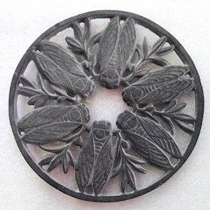 Cast iron cicada trivet