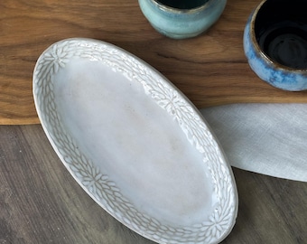 Handmade oval carved serving dish