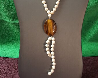 Free form Natural Tigers eye, 8mm Howlite, beaded Necklace. .925 silver clasp 20" in Length.
