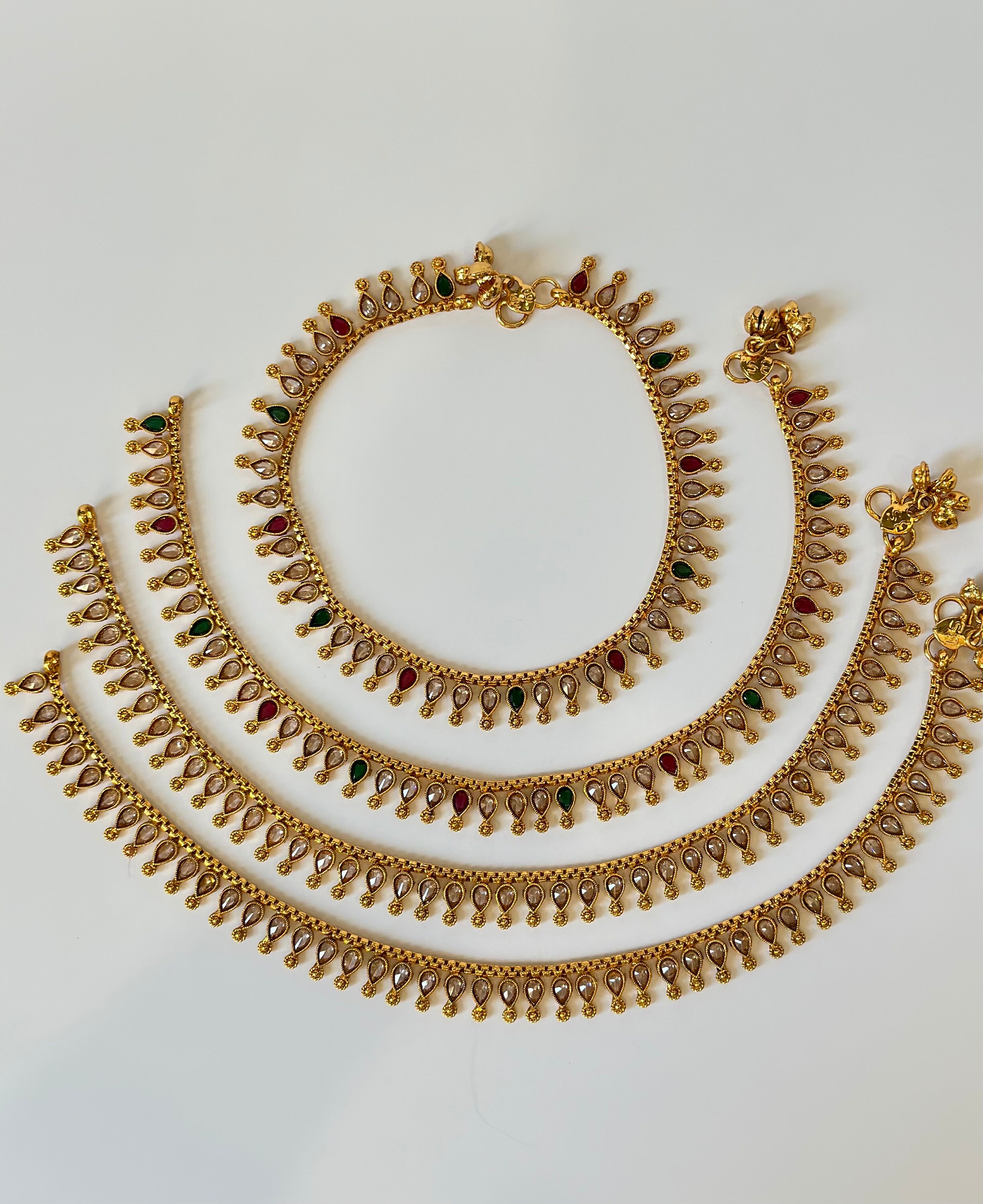 Gold nupur design online