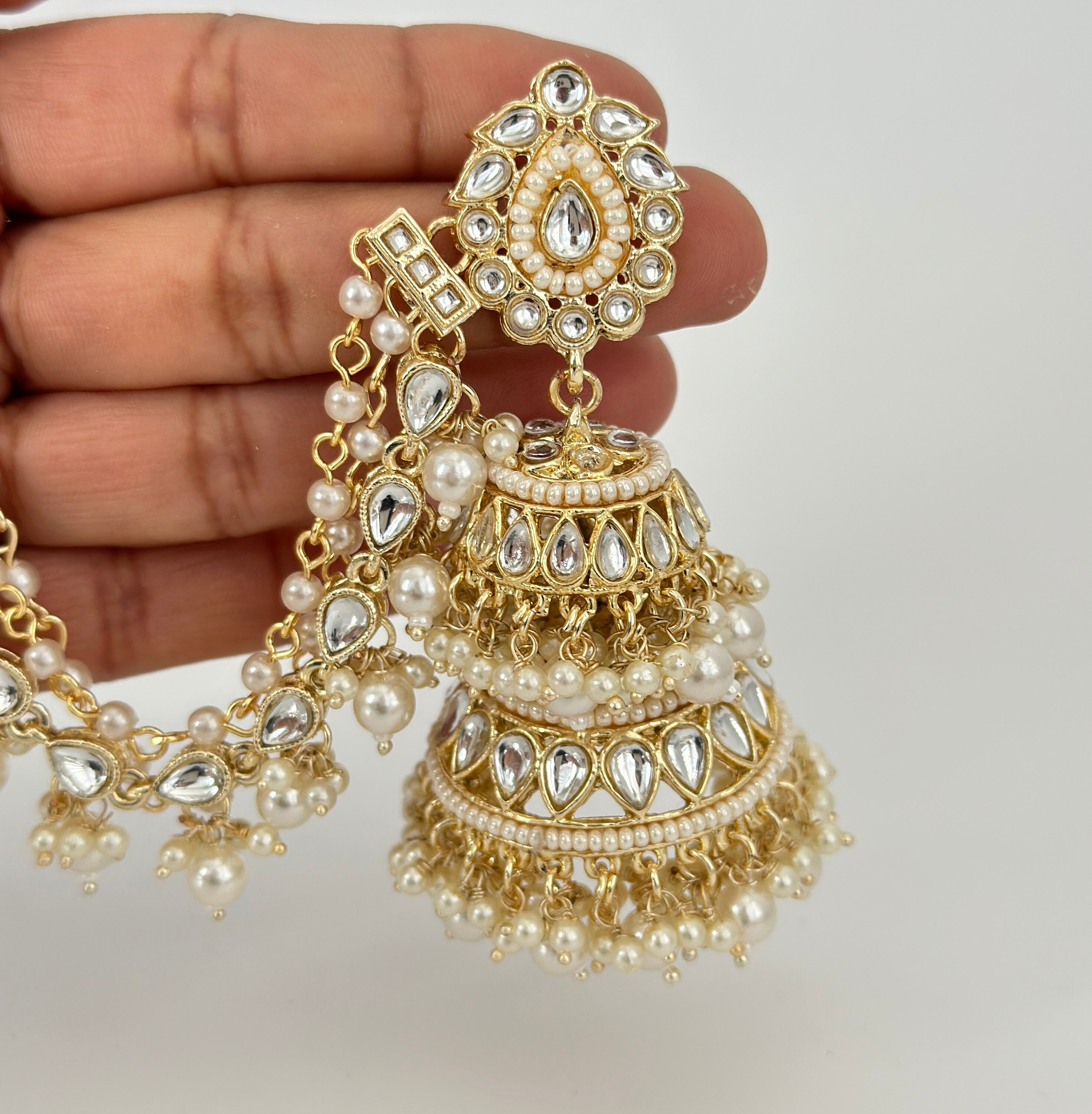 BridalTrendAlert: The 80's Bahubali Earrings Are Back! | Bridal jewellery  inspiration, Indian jewelry earrings, Indian bridal hairstyles