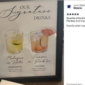 Pu&ograve; includere: Un cartello incorniciato intitolato Our Signature Drinks con illustrazioni di un margarita giallo etichettato Malayna in White e un paloma rosa etichettato Damani in Black tie, con elenchi di ingredienti per tequila, triple sec, lime, sciroppo di vaniglia, pompelmo e agave.