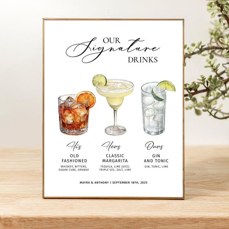 Pu&ograve; includere: Un cartello rettangolare con cornice dorata che presenta il testo "OUR SIGNATURE DRINKS" sopra le illustrazioni di un Old Fashioned, un Margarita classico e un Gin Tonic. Sotto le bevande ci sono etichette e "MAYRA & ANTHONY | SEPTEMBER 18TH, 2025".