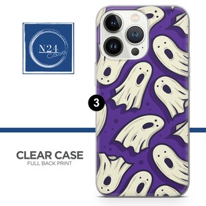 May include: Clear phone case with a purple background and a white ghost pattern. The case has a raised camera bump with three lenses.