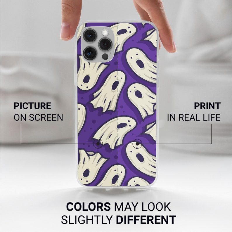 May include: A clear phone case with a purple background and a white ghost pattern. The case is designed for an iPhone with a triple lens camera.