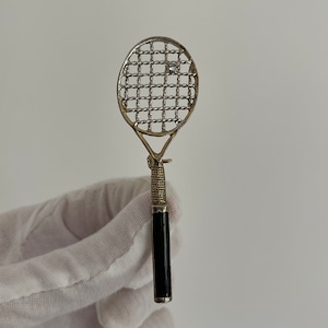 Vintage tennis racket brooch with ball