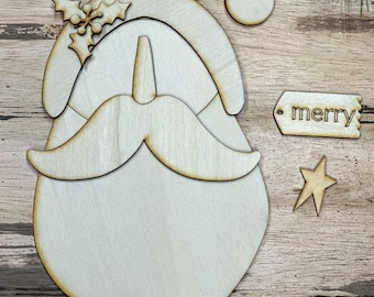 Adorno navideño rústico de madera sin acabado cortado con láser, ideal para manualidades navideñas.