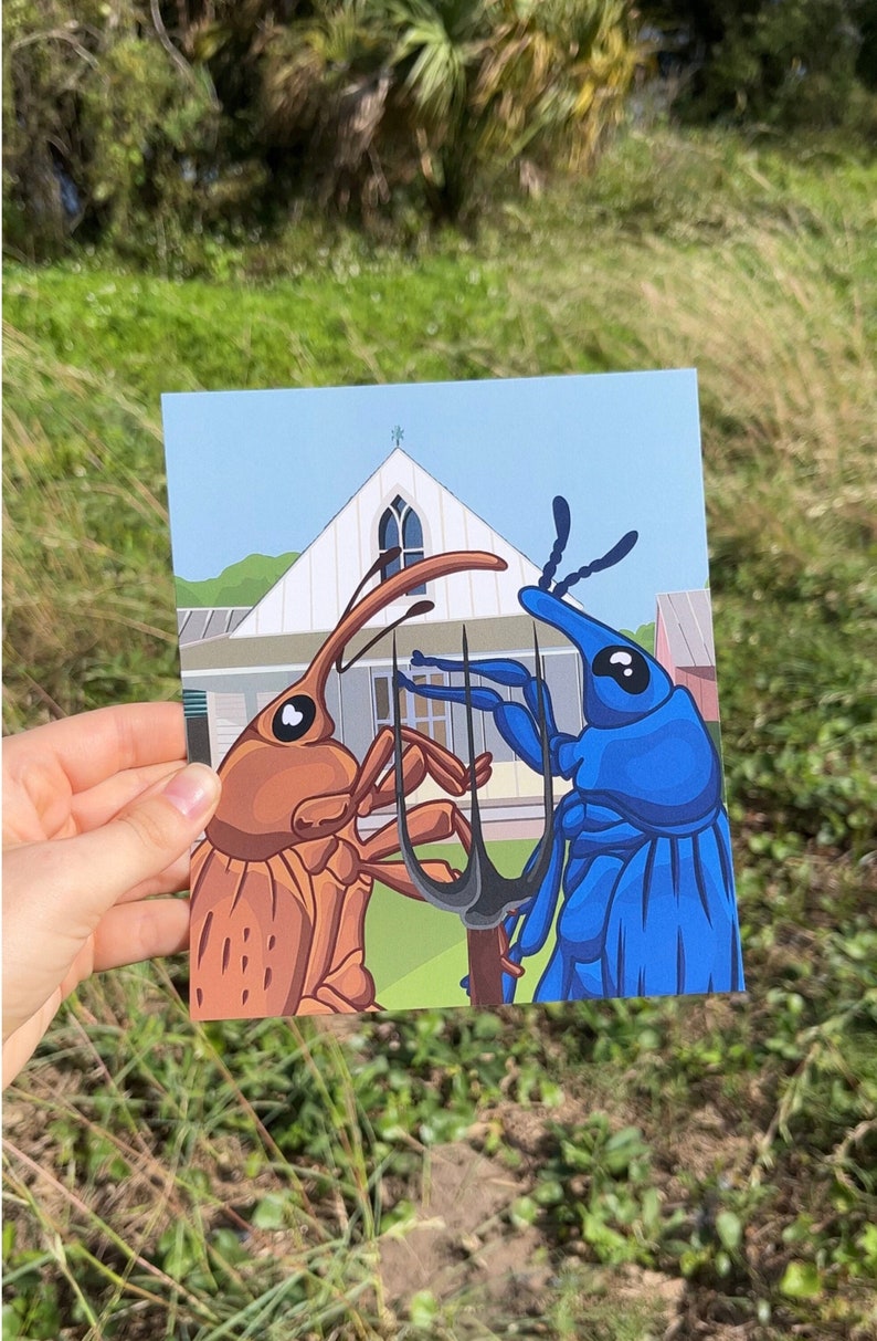 May include: A postcard illustration of two cartoon beetles, one brown and one blue, standing on a black garden fork in front of a white house with a blue roof.