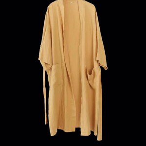 May include: A long, light yellow robe with a tie belt and two pockets. The robe is made of a soft, lightweight fabric.