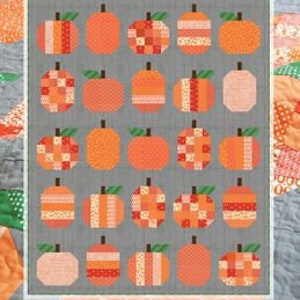 May include: A quilt featuring a repeating pattern of orange pumpkins with green stems on a gray background. The quilt is labeled "Pumpkins" and measures 58" x 72". The quilt is a fat quarter design.