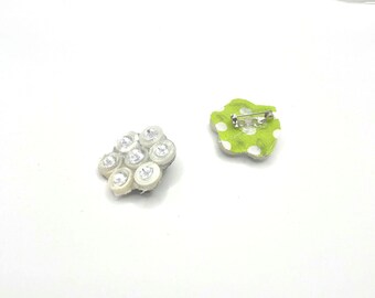 Hexagon brooches made from buttons